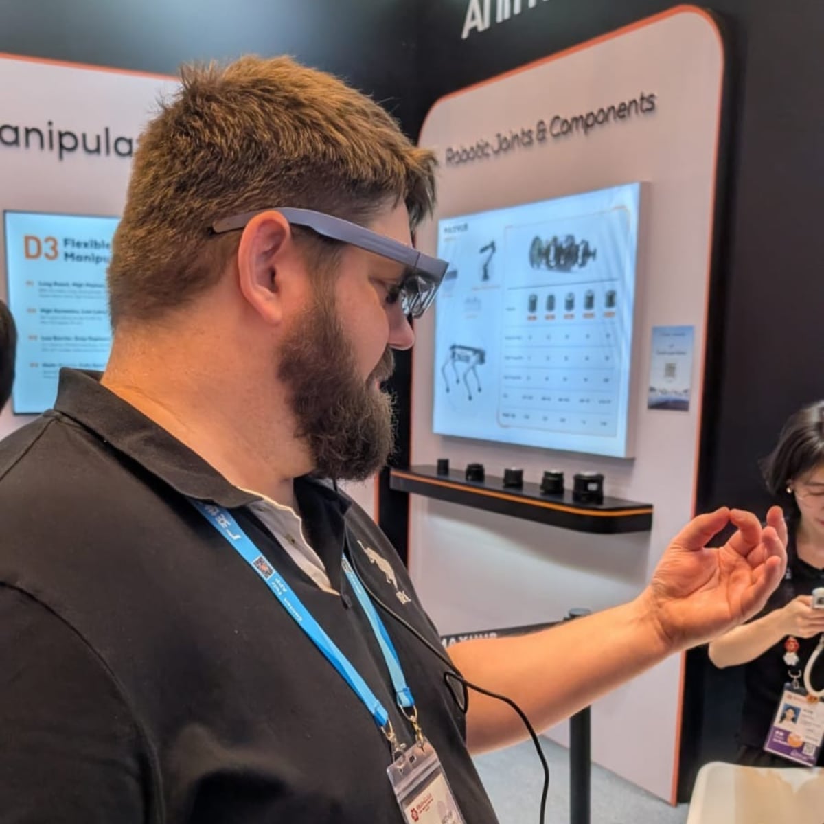 Matthew trying Xrany X1 AR glasses at Canton Fair